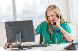 healthcare team member on computer